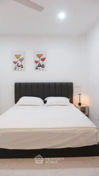 Modern bedroom with stylish decor and cozy ambiance