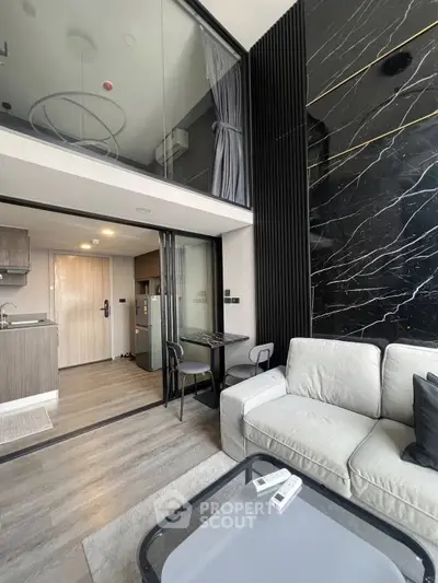 Modern duplex apartment with stylish living room and open kitchen layout