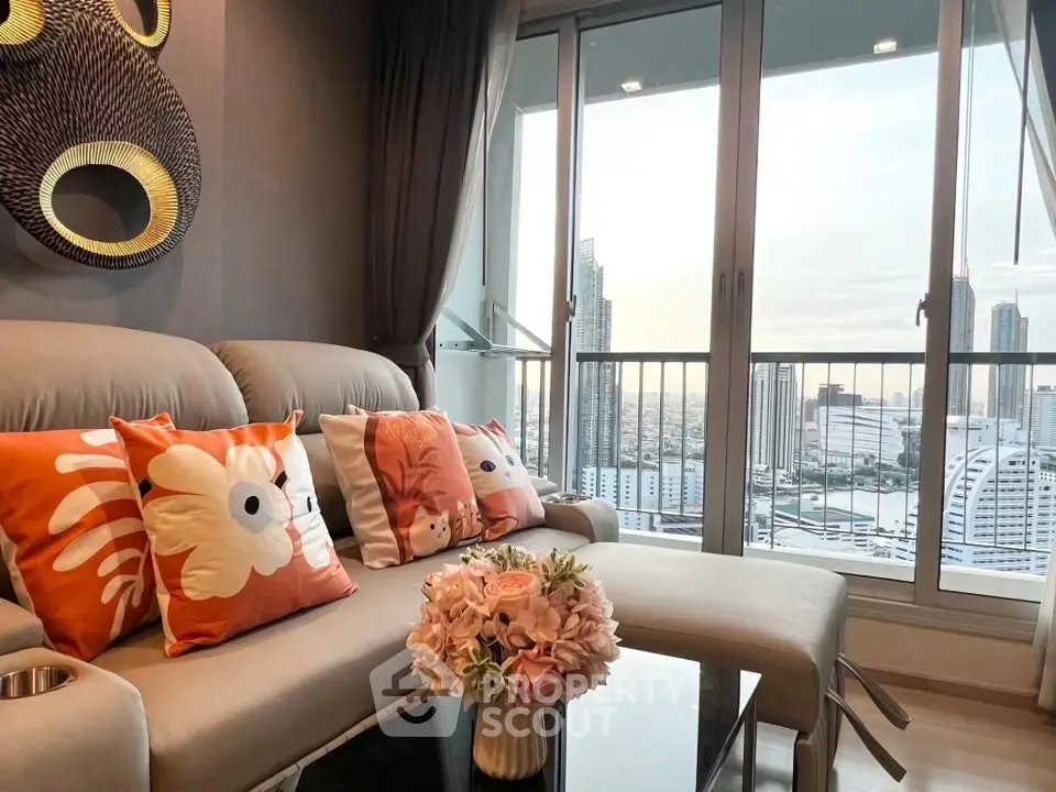 Stylish living room with modern decor and stunning city view from balcony.