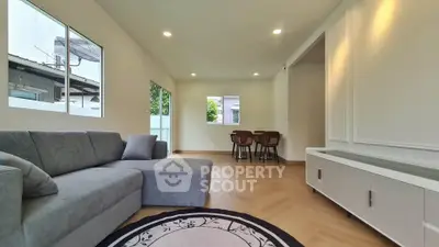 Spacious modern living room with elegant decor and natural light