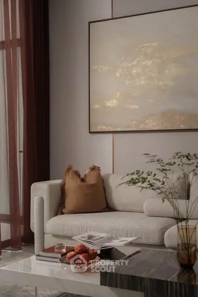 Elegant living room with modern sofa, abstract art, and stylish decor.