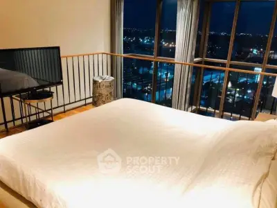 Luxurious bedroom with stunning night city view and modern decor