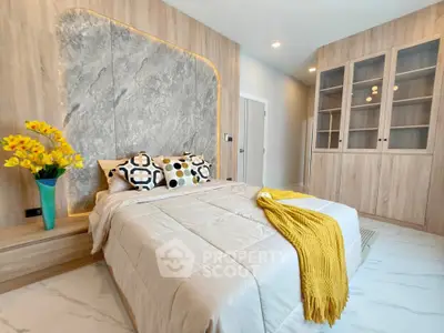 Luxurious bedroom with modern design, featuring elegant wood paneling and stylish decor.