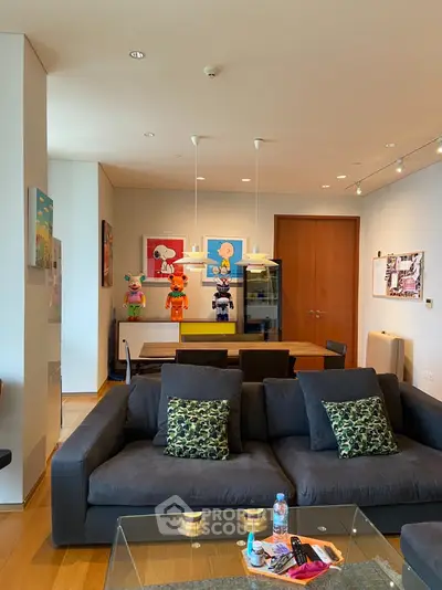 Stylish living room with modern decor and plush seating in a contemporary apartment
