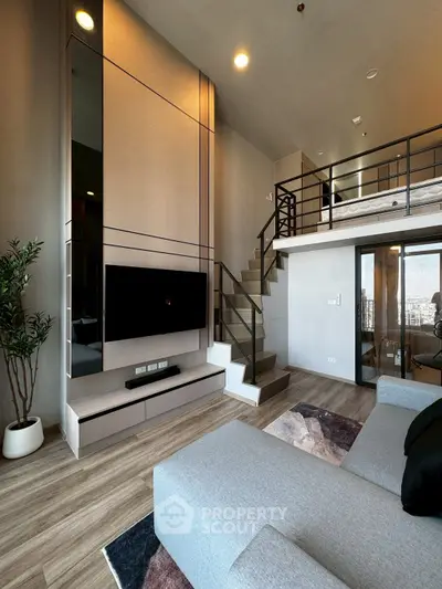 Modern loft apartment with stylish living room and mezzanine bedroom