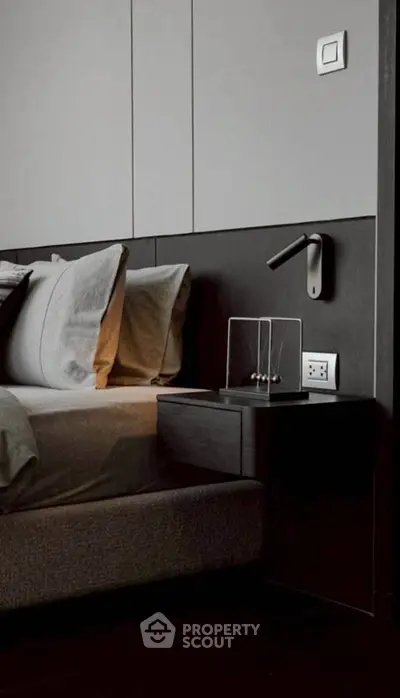 Modern bedroom with sleek design and stylish lighting