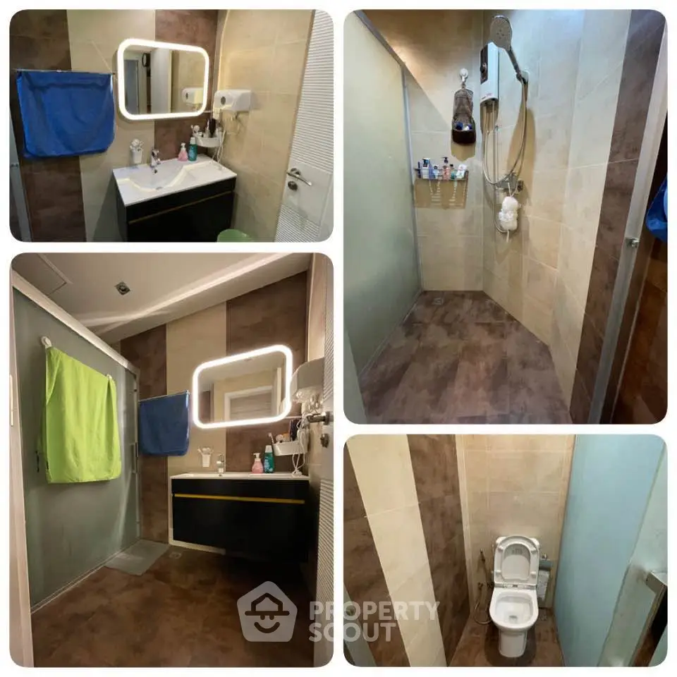Modern bathroom with sleek fixtures and spacious shower area in a contemporary home.