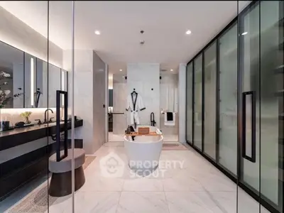 Luxurious modern bathroom with freestanding tub and elegant marble finishes