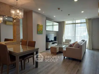 Spacious modern living room with elegant decor and large windows