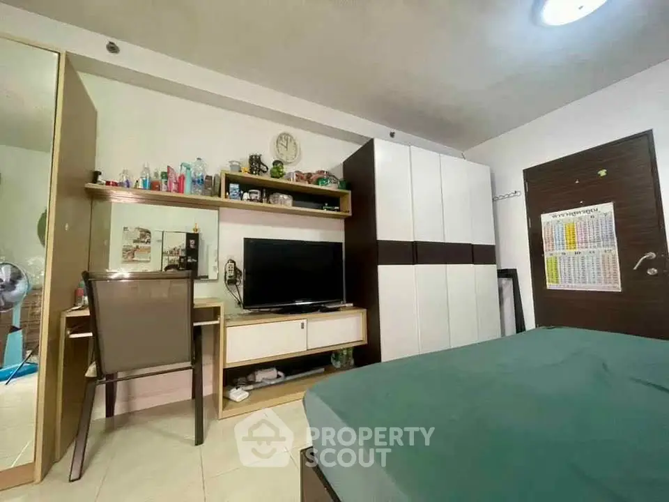 Cozy bedroom with modern furniture and ample storage space