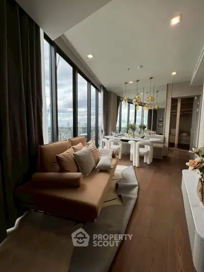 Luxurious modern living room with panoramic city views and elegant dining area.