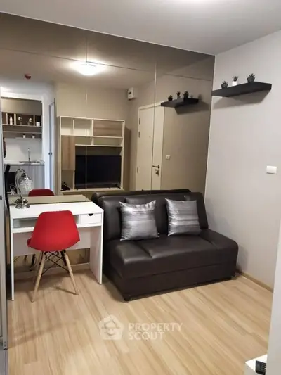 Modern living room with sleek sofa and stylish decor in cozy apartment