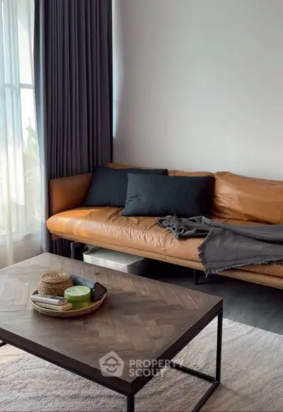 Stylish living room with leather sofa and modern coffee table
