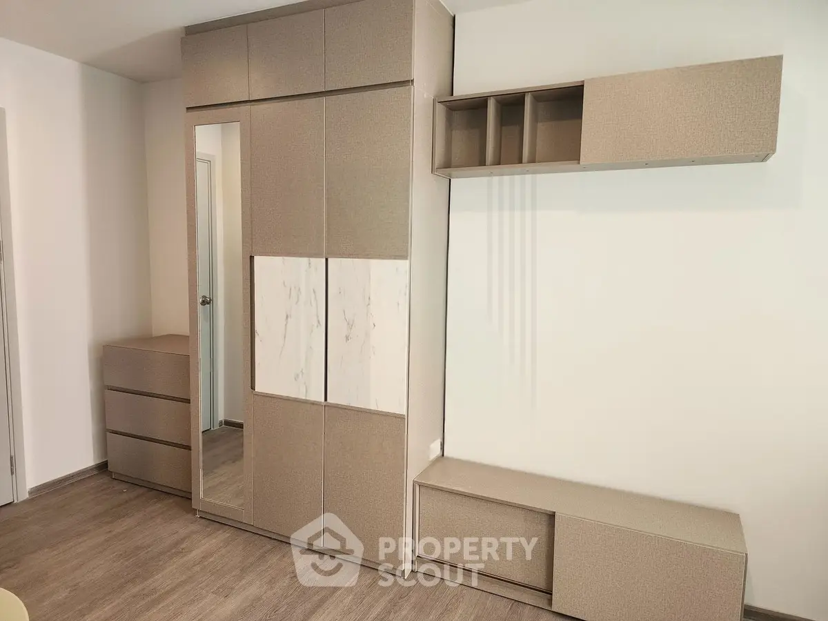 Modern bedroom with sleek storage solutions and minimalist design