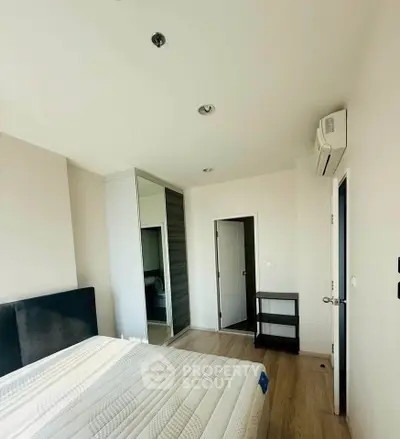 Bright and airy bedroom with modern design and ample natural light