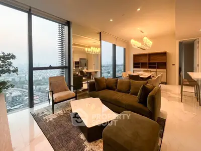 Luxurious high-rise living room with stunning city view and modern furnishings