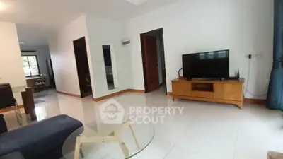 Spacious living room with modern furniture and natural light