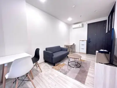 Modern living room with sleek furniture and neutral tones, perfect for urban living.