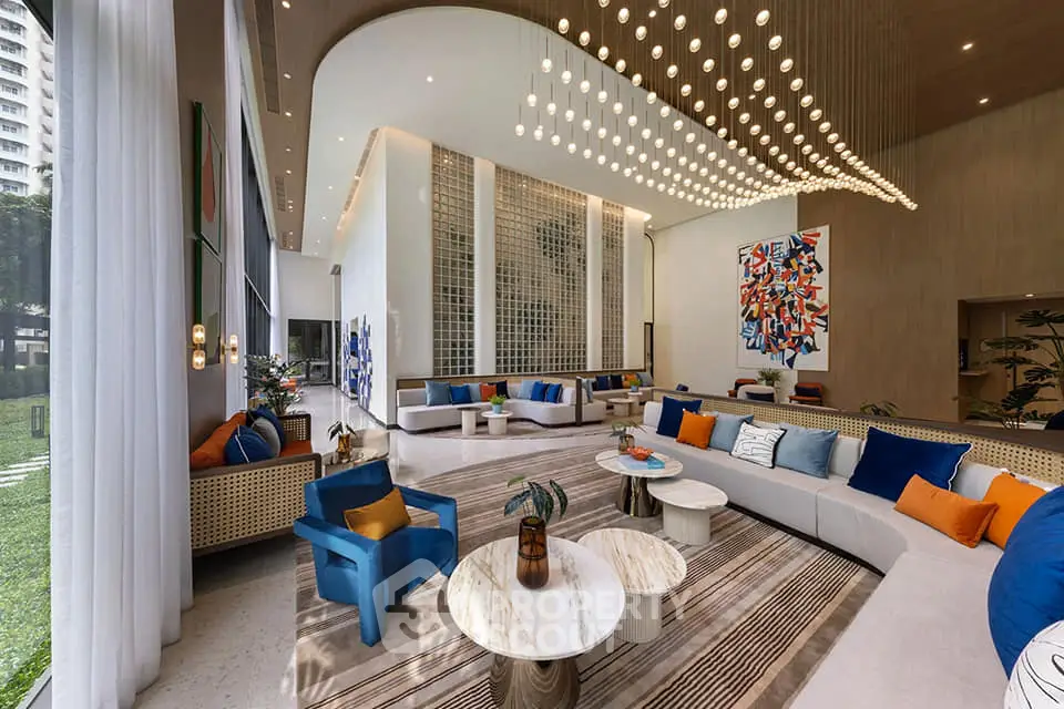 Luxurious modern living room with high ceilings, elegant lighting, and stylish decor in a premium real estate property.