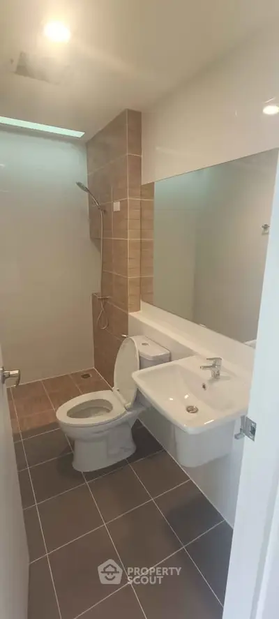 Modern bathroom with sleek design and spacious shower area