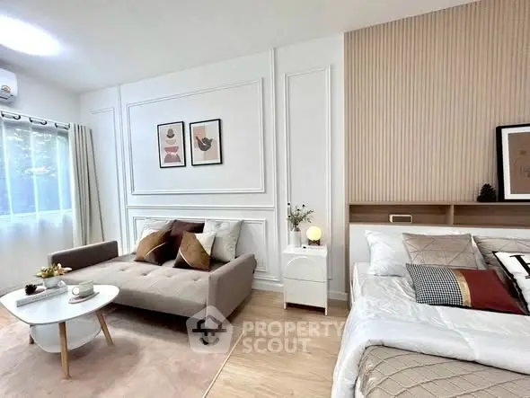 Modern studio apartment with stylish decor and natural light