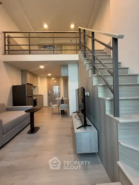 Modern loft apartment with stylish mezzanine and sleek interior design