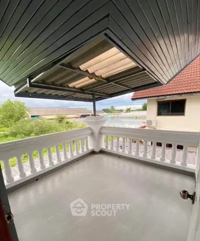 Charming balcony with scenic view and stylish roof design