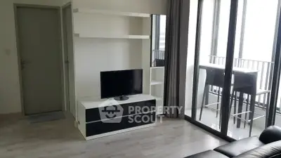 Modern living room with balcony and sleek furniture
