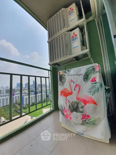 Charming balcony with city view and tropical decor, perfect for relaxation and enjoying the skyline.