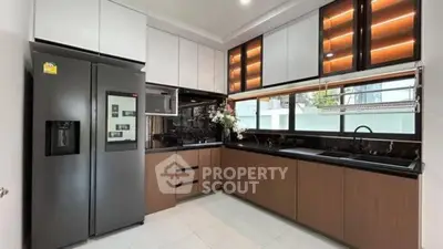 Modern kitchen with sleek cabinets and stainless steel appliances