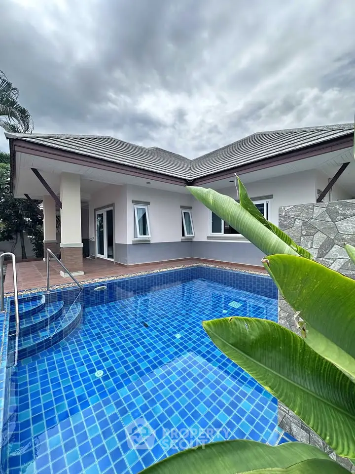 Charming villa with private pool and lush greenery, perfect for luxury living.