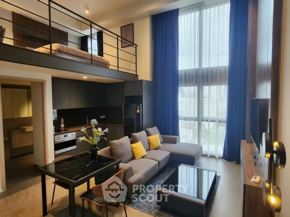 Modern loft apartment with high ceilings and stylish decor