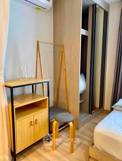 Modern bedroom with stylish wooden furniture and ample storage space