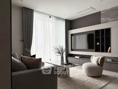 Modern living room with sleek furniture and large TV, featuring elegant curtains and a stylish coffee table.