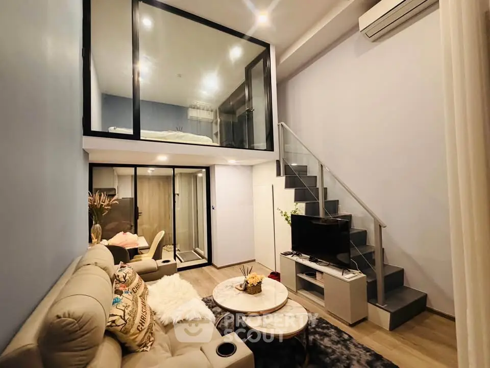 Modern loft apartment with stylish living room and mezzanine bedroom