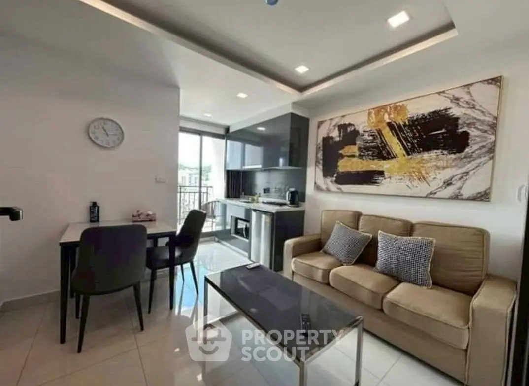 Modern living room with stylish decor and open kitchen layout