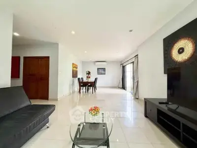 Spacious modern living room with sleek furniture and elegant decor