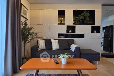 Modern living room with stylish decor and cozy seating area