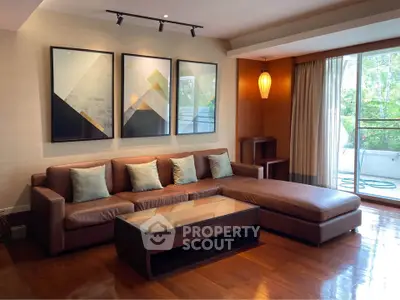 Elegant living room with modern art and spacious seating area