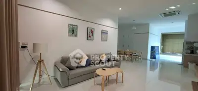 Spacious modern living room with elegant decor and dining area