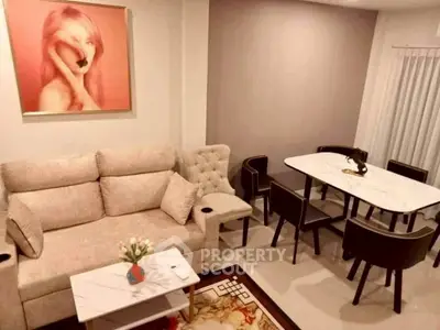 Modern living room with stylish dining area and elegant decor