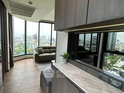 Luxurious corner unit with panoramic city views and elegant interior design