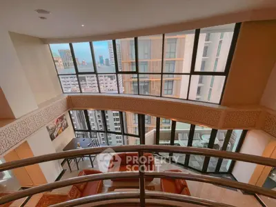 Luxurious high-rise apartment with stunning city view and spacious living area