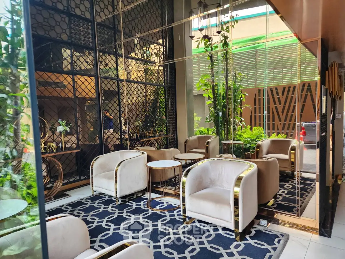 Luxurious modern lobby with elegant seating and stylish decor, perfect for welcoming guests.
