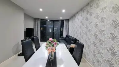 Modern dining area with elegant decor and stylish furniture in a contemporary apartment.