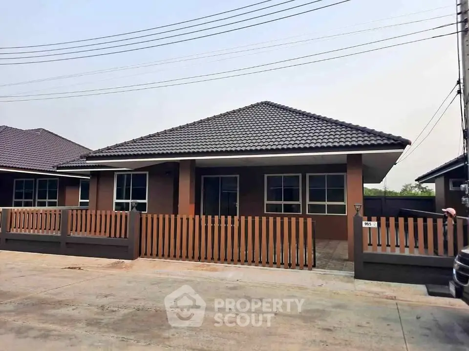 Charming single-story home with modern design and fenced yard in a serene neighborhood.