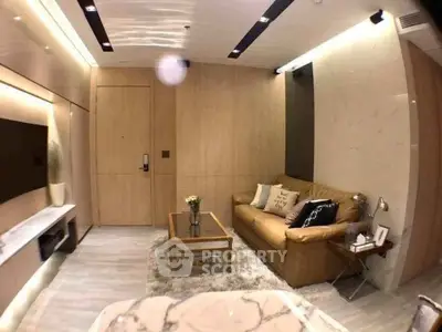 Modern living room with cozy leather sofa and stylish decor in a contemporary apartment.