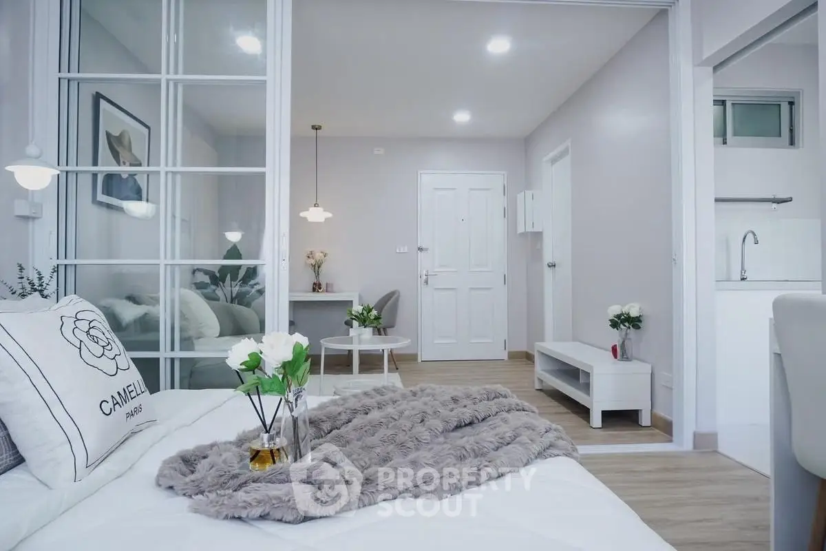 Modern bedroom with elegant decor and open layout in stylish apartment