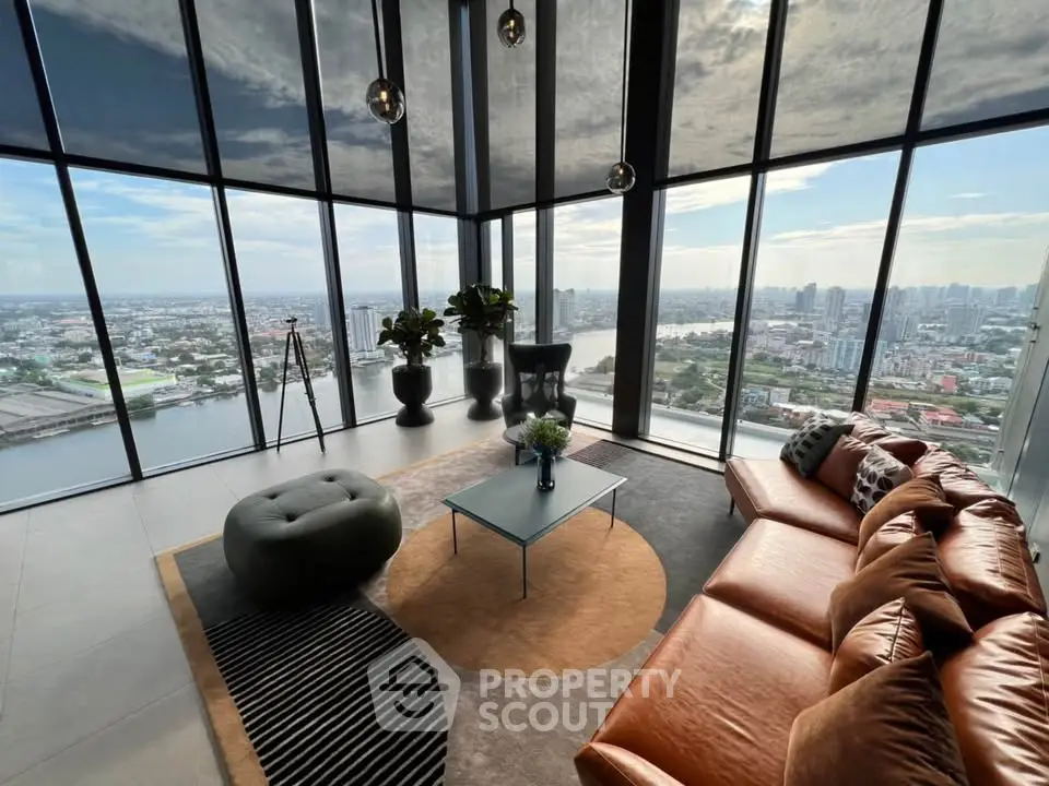 Luxurious living room with panoramic city views and modern furnishings.
