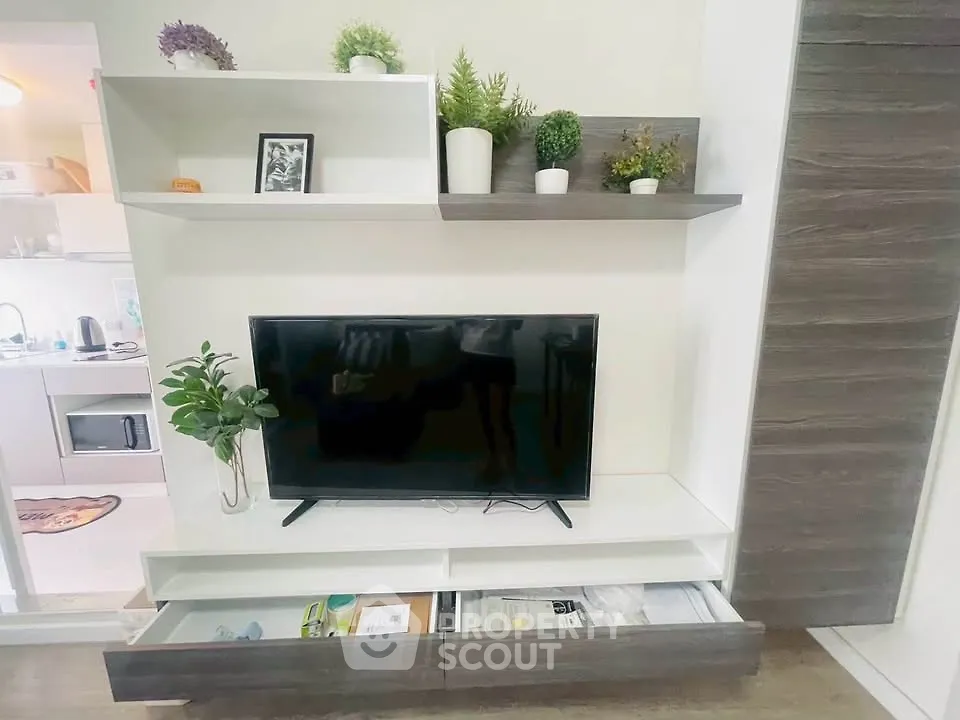 Modern living room with sleek TV unit and stylish decor